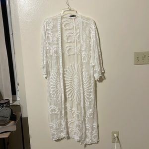 Brand new cover up. One size fits all.